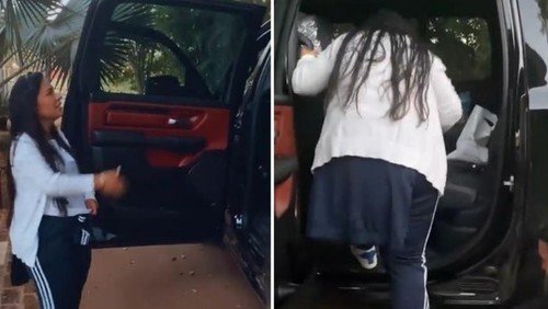 Simone precisa de ajuda de assistente para subir em carro novo