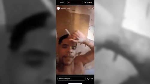 Preso por matar PM em "saidinha" posta vídeo fumando e ouvindo música na prisão