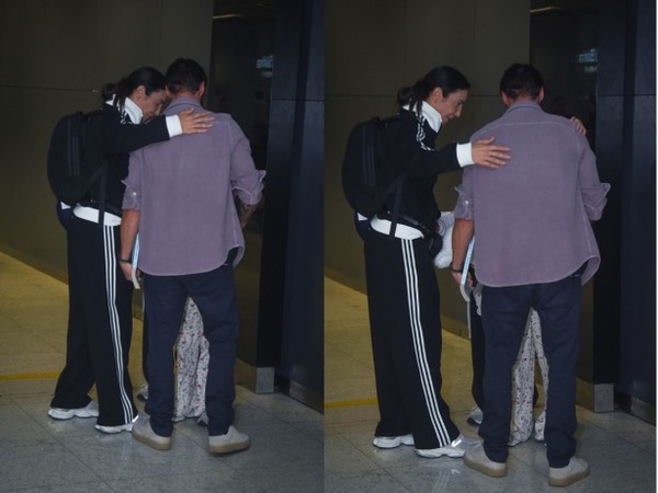 Ivete Sangalo é recebida pelo ex-marido, Daniel Cady, ao chegar de viagem