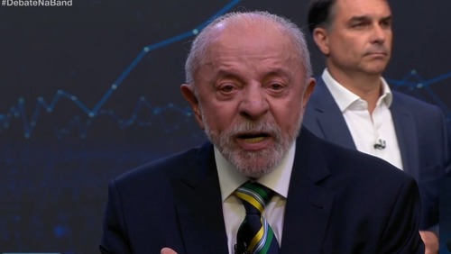 Debate na Band: Lula defende 'saidinha' de presos e provoca Flávio sobre indulto ao pai